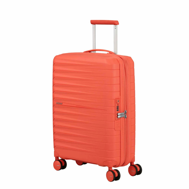 American Tourister Luggage Limited Edition: Sunset Coral American Tourister Fastforward Expandable Spinner Carry-On Luggage
