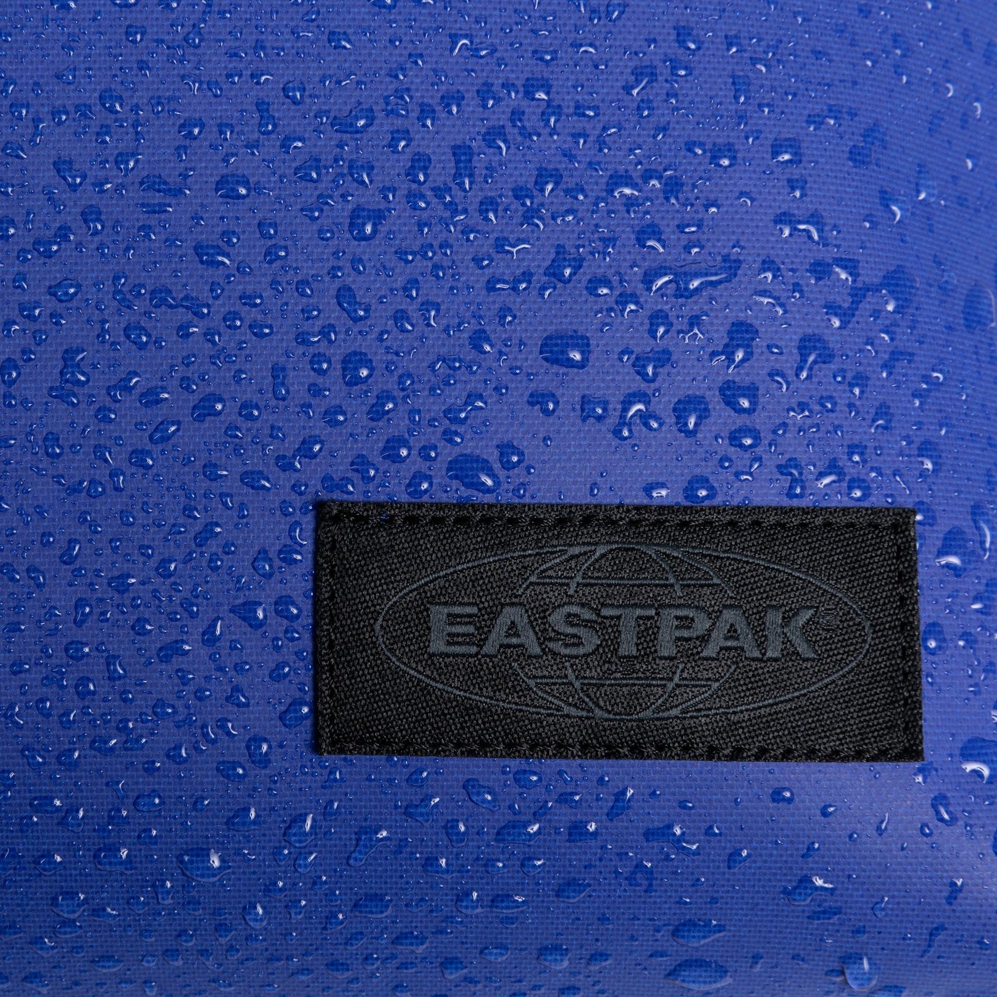 Eastpak Wheeled Duffle Tarp Blue Eastpak Duffel Pack Wheel M - Tarp Blue