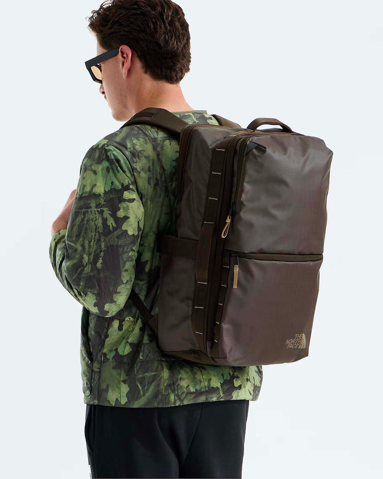 The North Face Backpacks Dark Chestnut/Garnet The North Face Base Camp Voyager Travel Pack - Dark Chestnut/Garnet