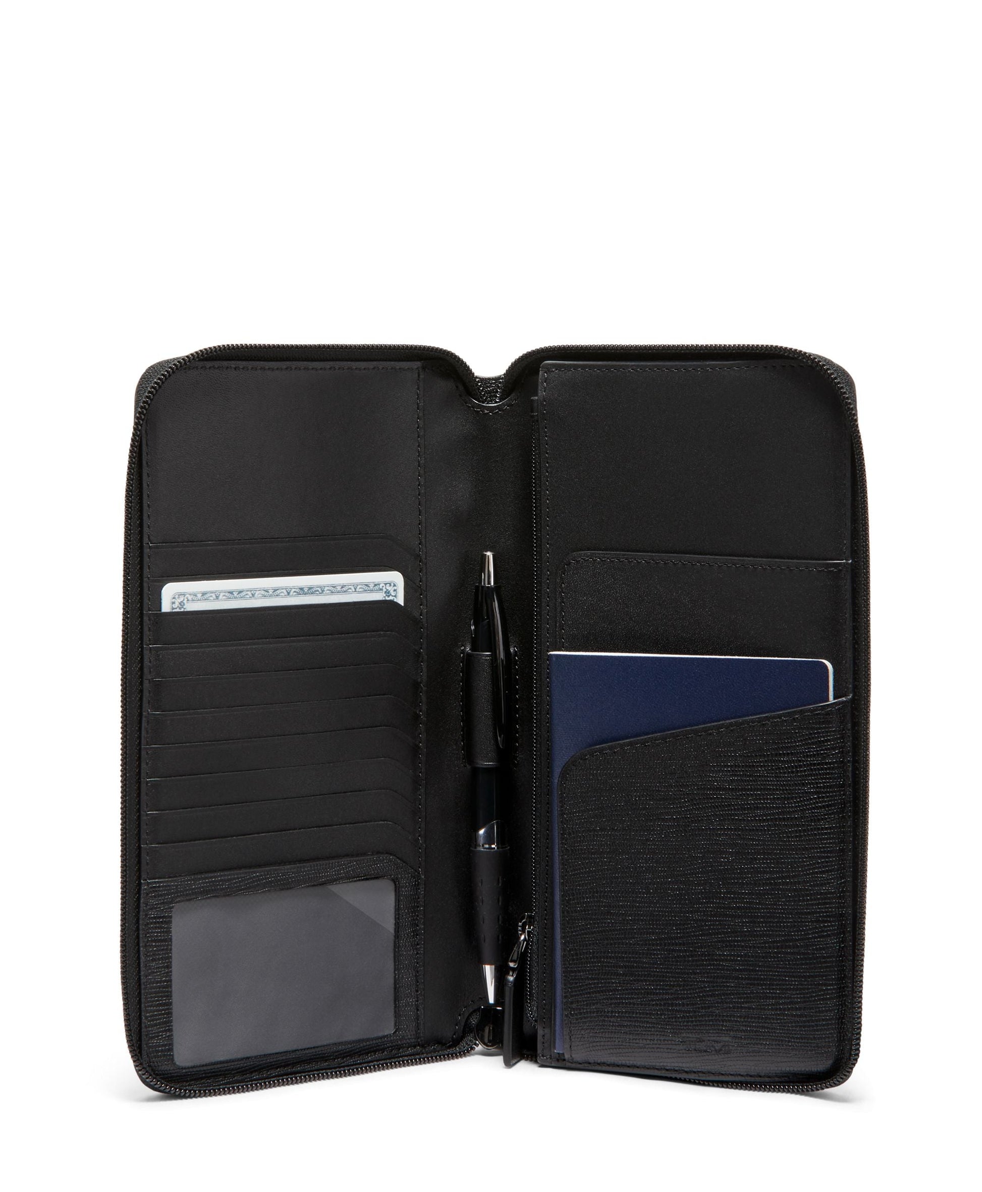 Tumi Wallets Black Embossed Tumi Nassau Travel Wallet