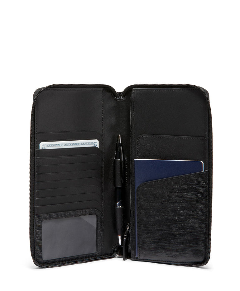 Tumi Wallets Black Embossed Tumi Nassau Travel Wallet